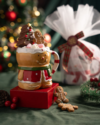 Christmas-themed mug with gingerbread decorations on a festive background