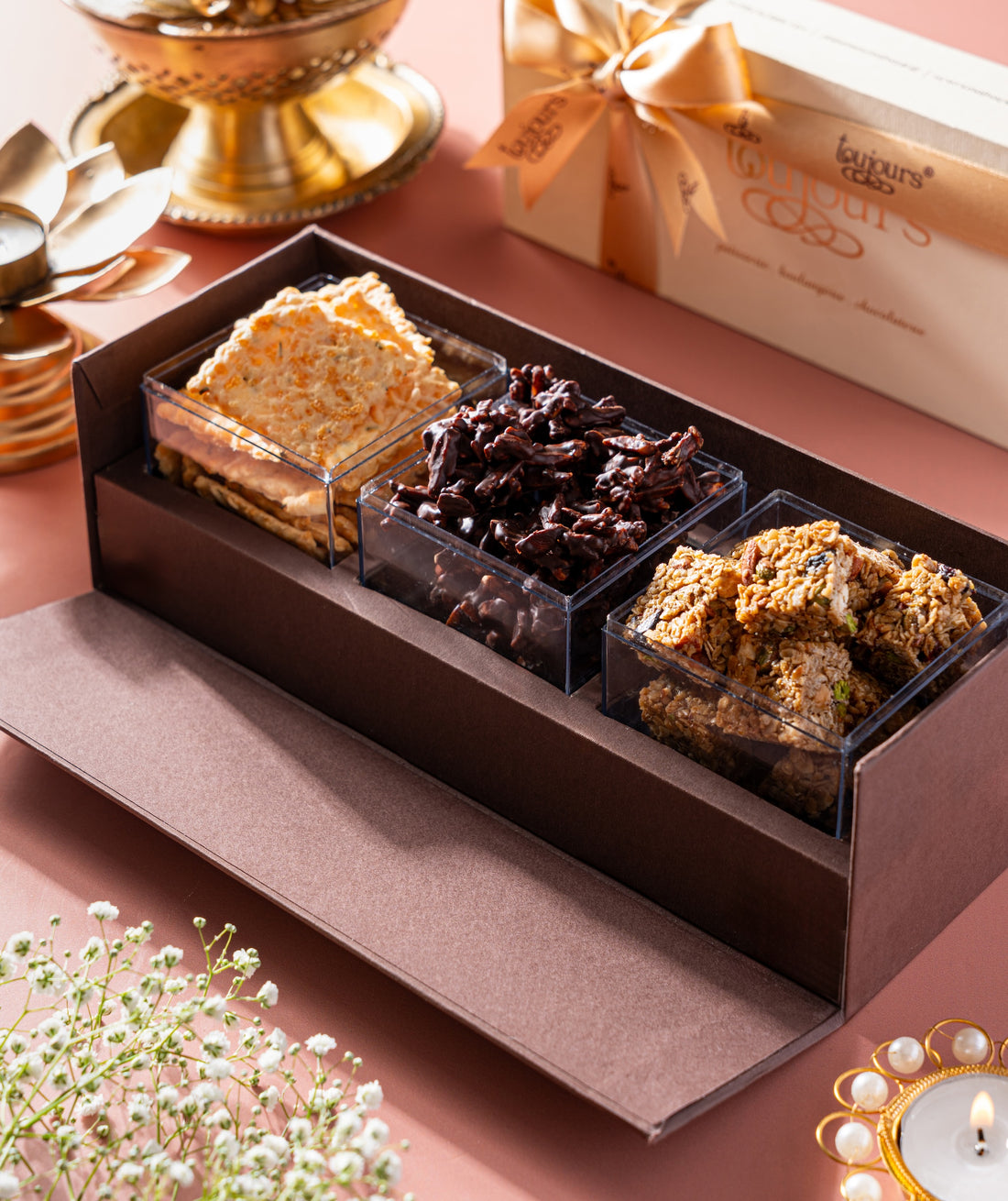 Assorted sweet and savoury goodies in a luxe gift box